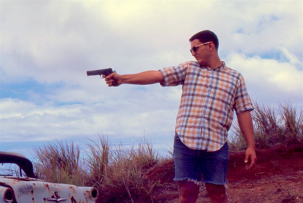 Andy shooting his .45 automatic, Guam 1968.