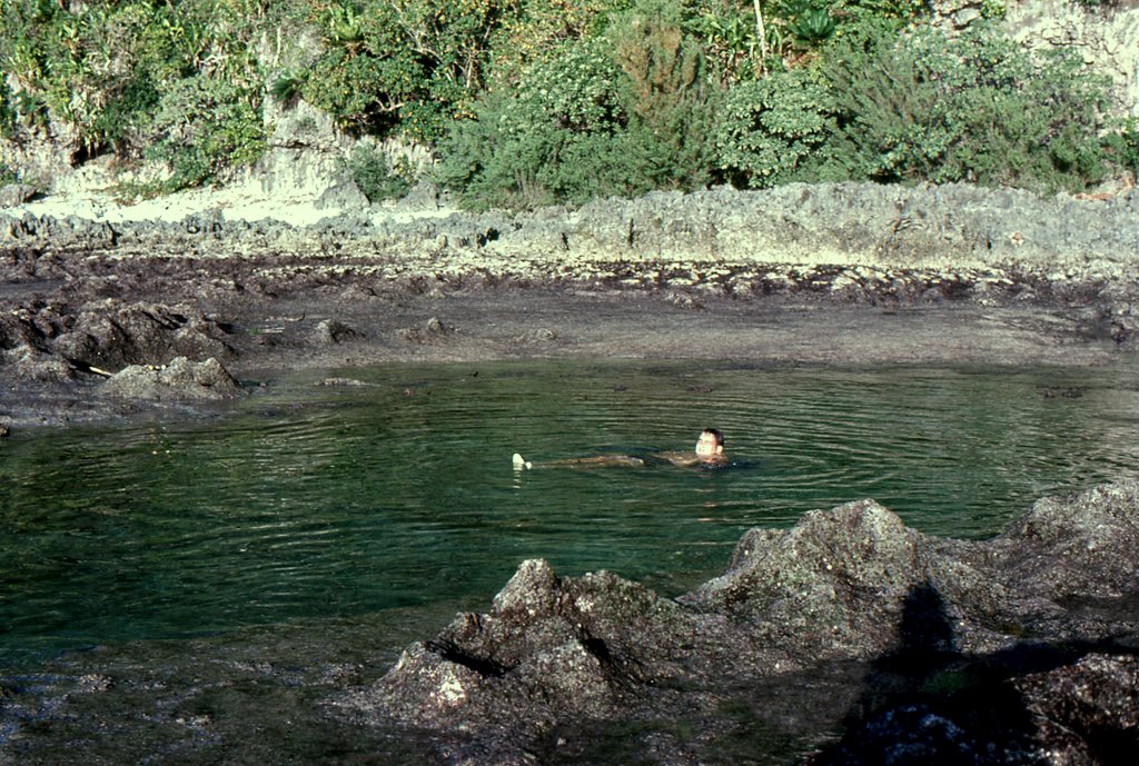 Andy floats in a tidal pool.