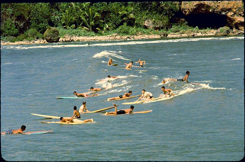 Crowd of surfers at Talofofo