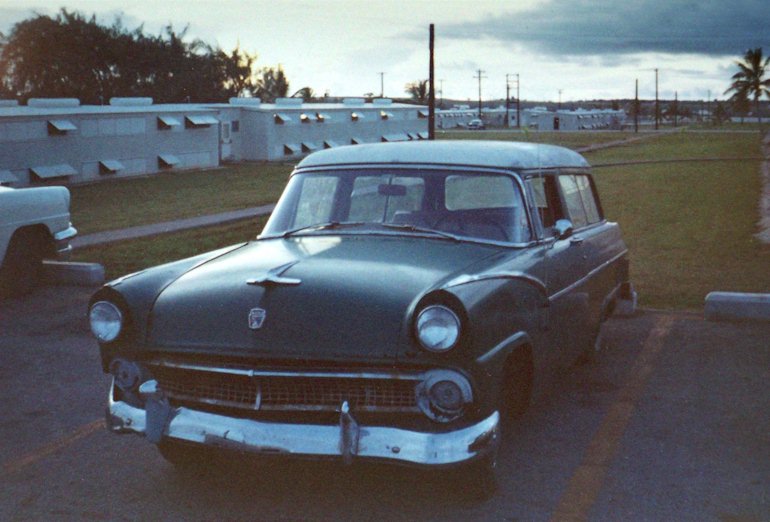 Ford wagon in front of MMS barracks